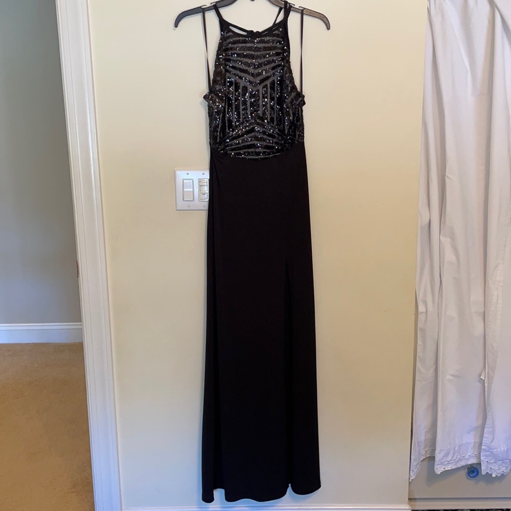 Beautiful black sequin gown with slit!